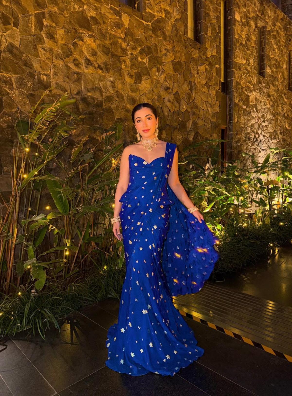 Electric blue jacquard corset and saree with golden zari butti embroidery