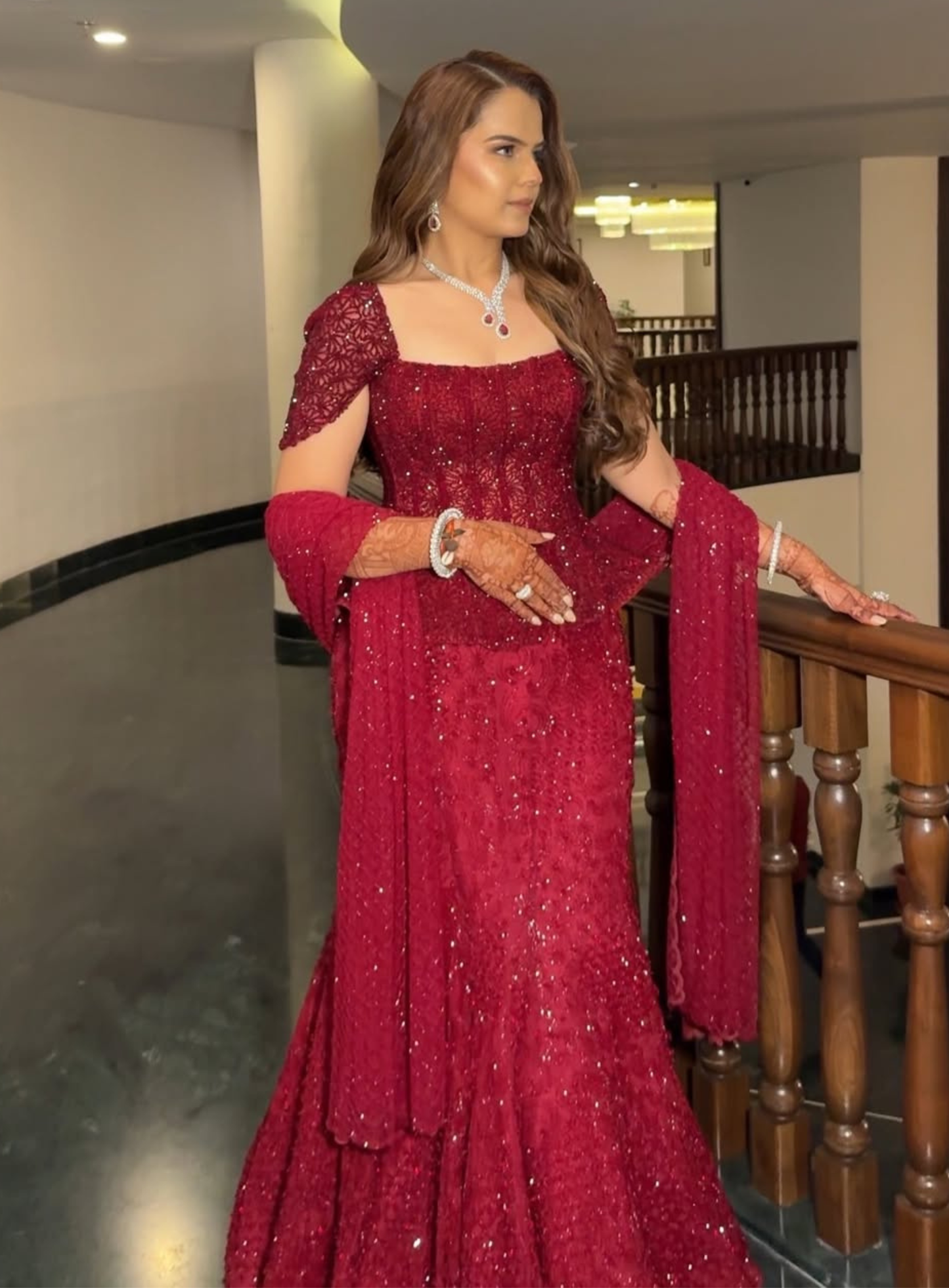 Maroon embellished corset with fishcut lehenga