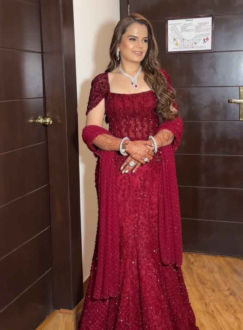 Maroon embellished corset with fishcut lehenga