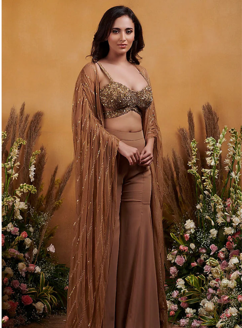 Antique gold metal sequin cut-out bustier with embellished cape and flared pants