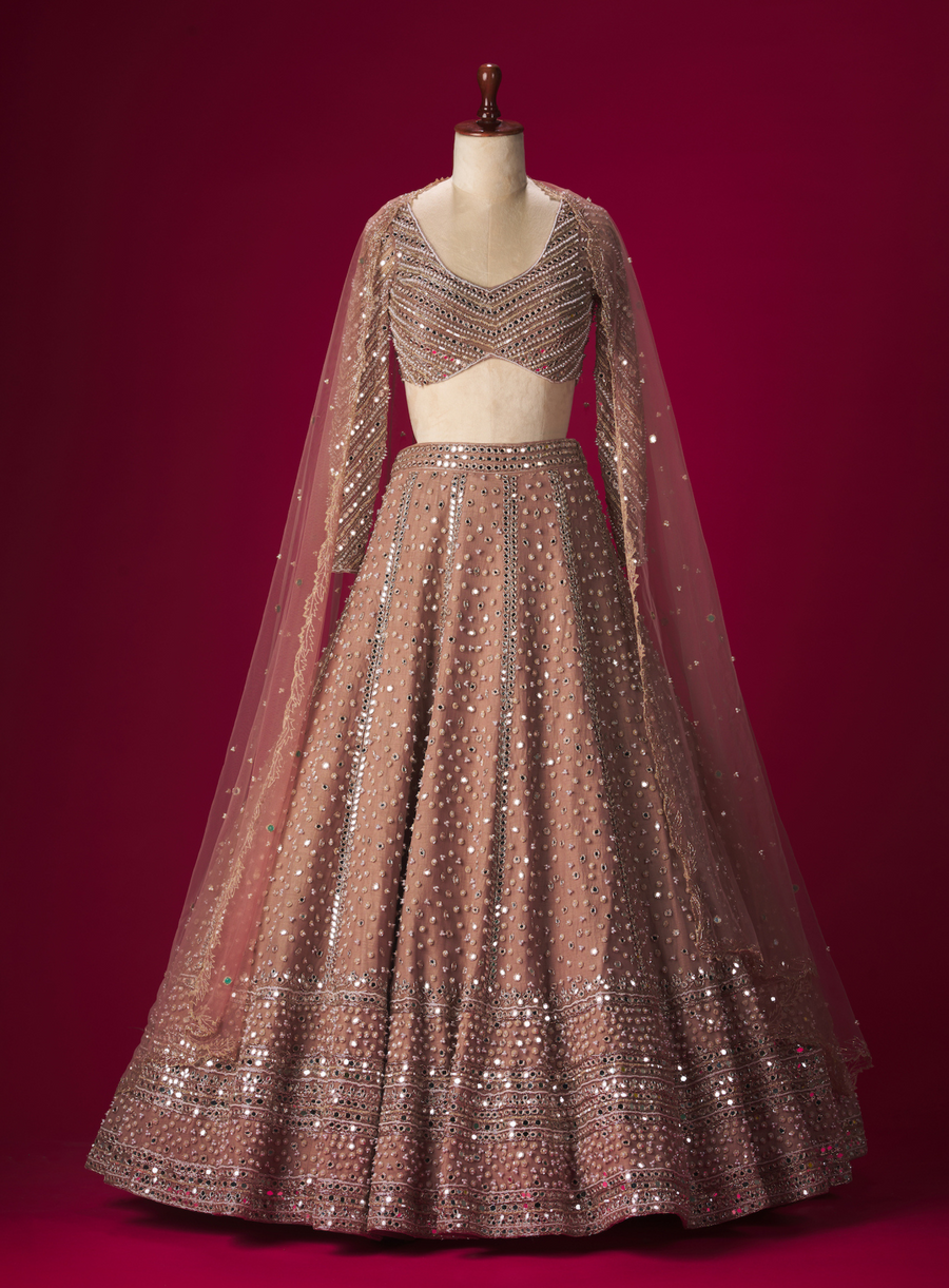 Mauve net lehenga set with mirror and pearl hand-embroidery