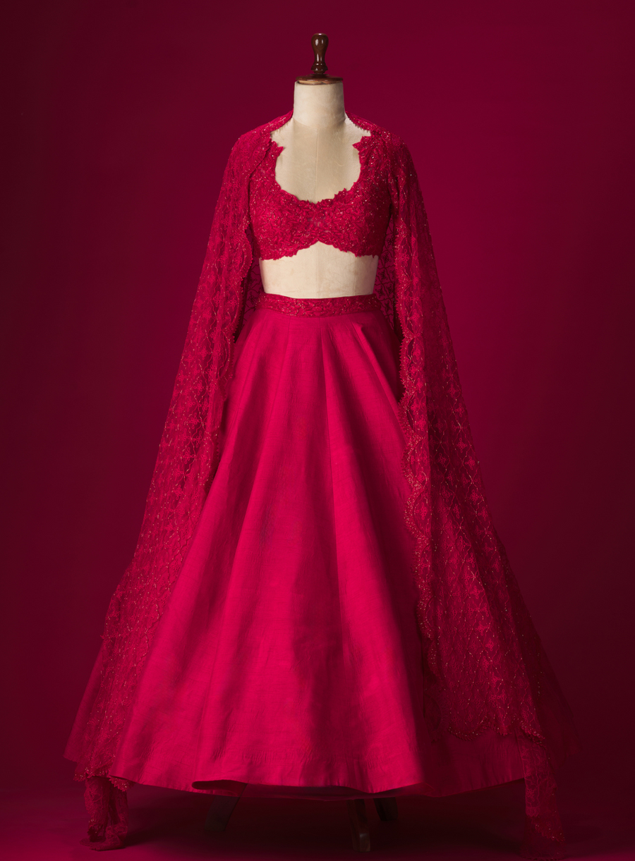 Cherry red dupion crepe lehenga with cut-work blouse in cutdana, thread and crystal embroidery