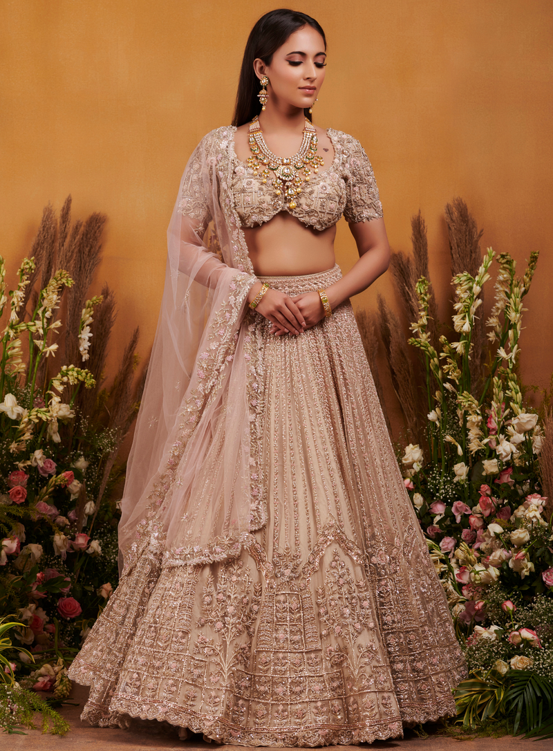 Ivory and gold Tulle lehenga with hand-embellished zardozi and cutdana work