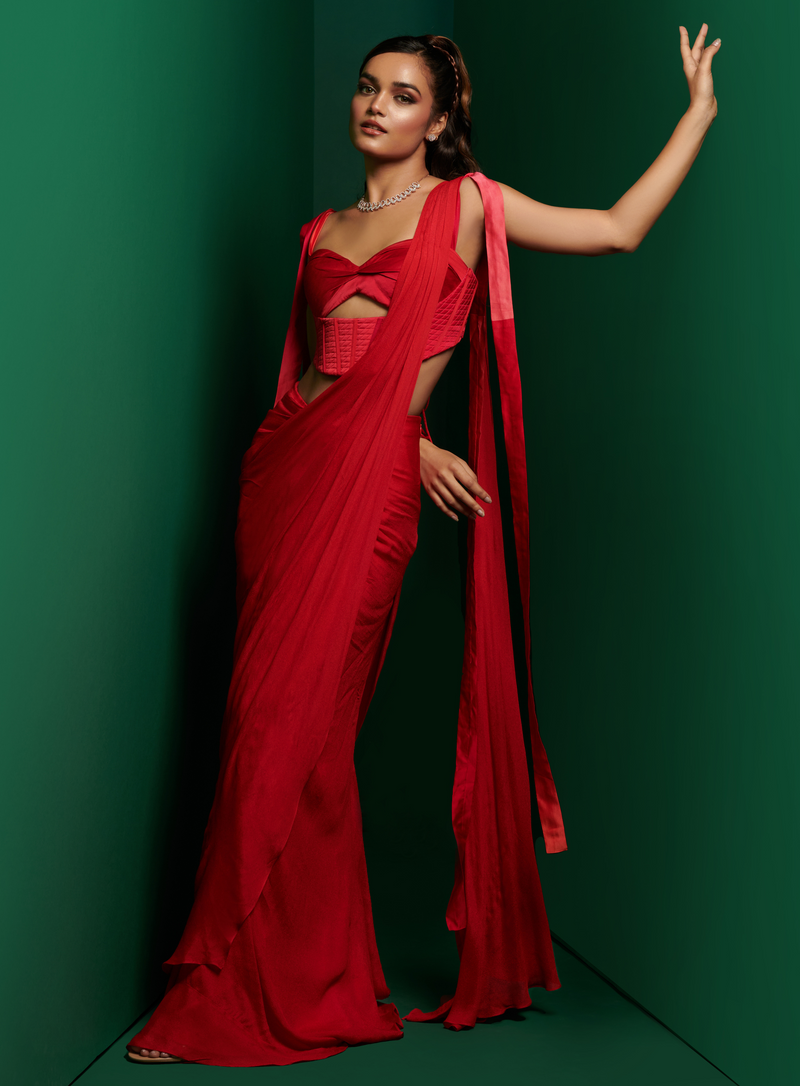 Crimson red cut-out corset with pleated drape saree