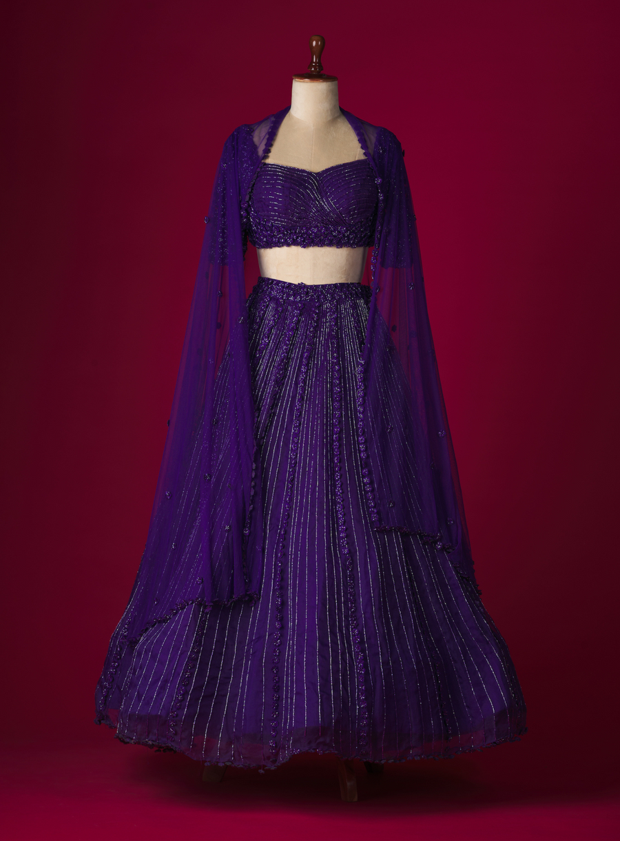 Purple organza lehenga with 3D flower and cutdana embellished blouse and dupatta