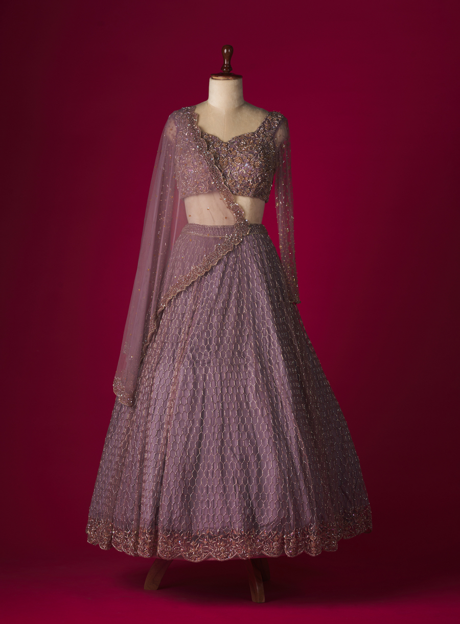Purple net lehenga set with zardozi, cutdana and sequin embroidery