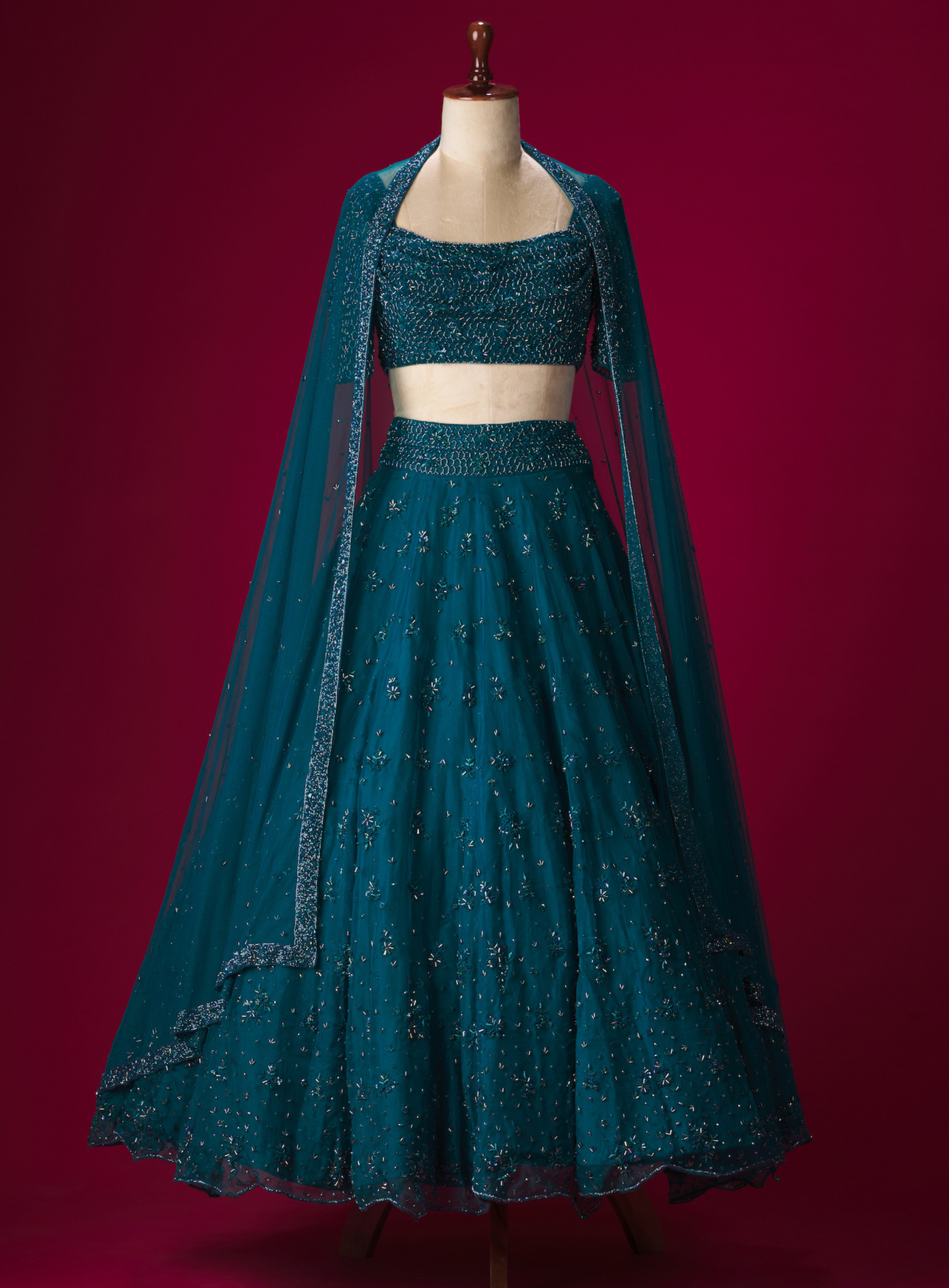 Imperial Blue Hand Embellished Cowl Neck Blouse and Lehenga With Dupatta