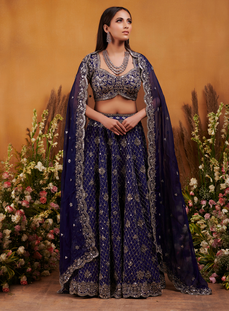 Blue lehenga with hand-embellished zardozi and mirror-work skirt