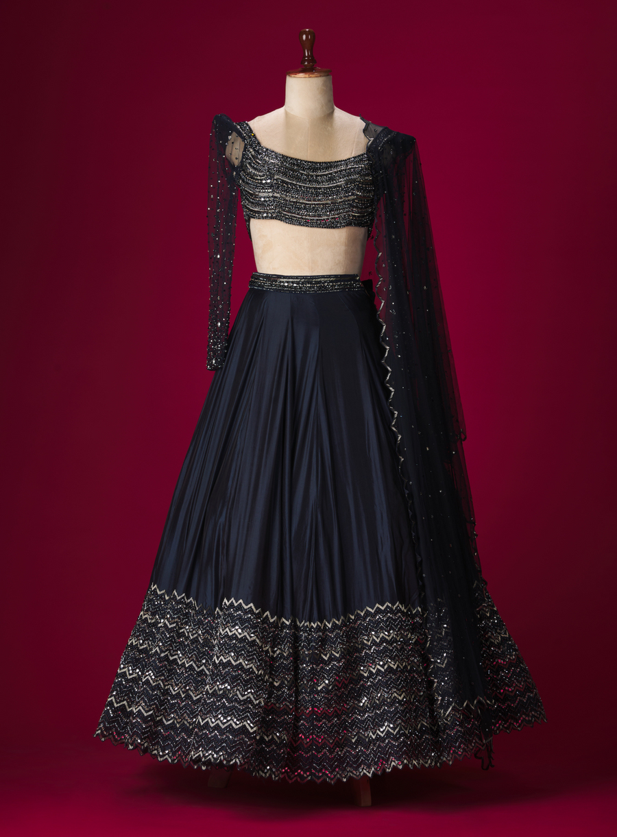 Indigo power-shoulder blouse with embellished skirt and dupatta in mirror, crystal and cutdana work