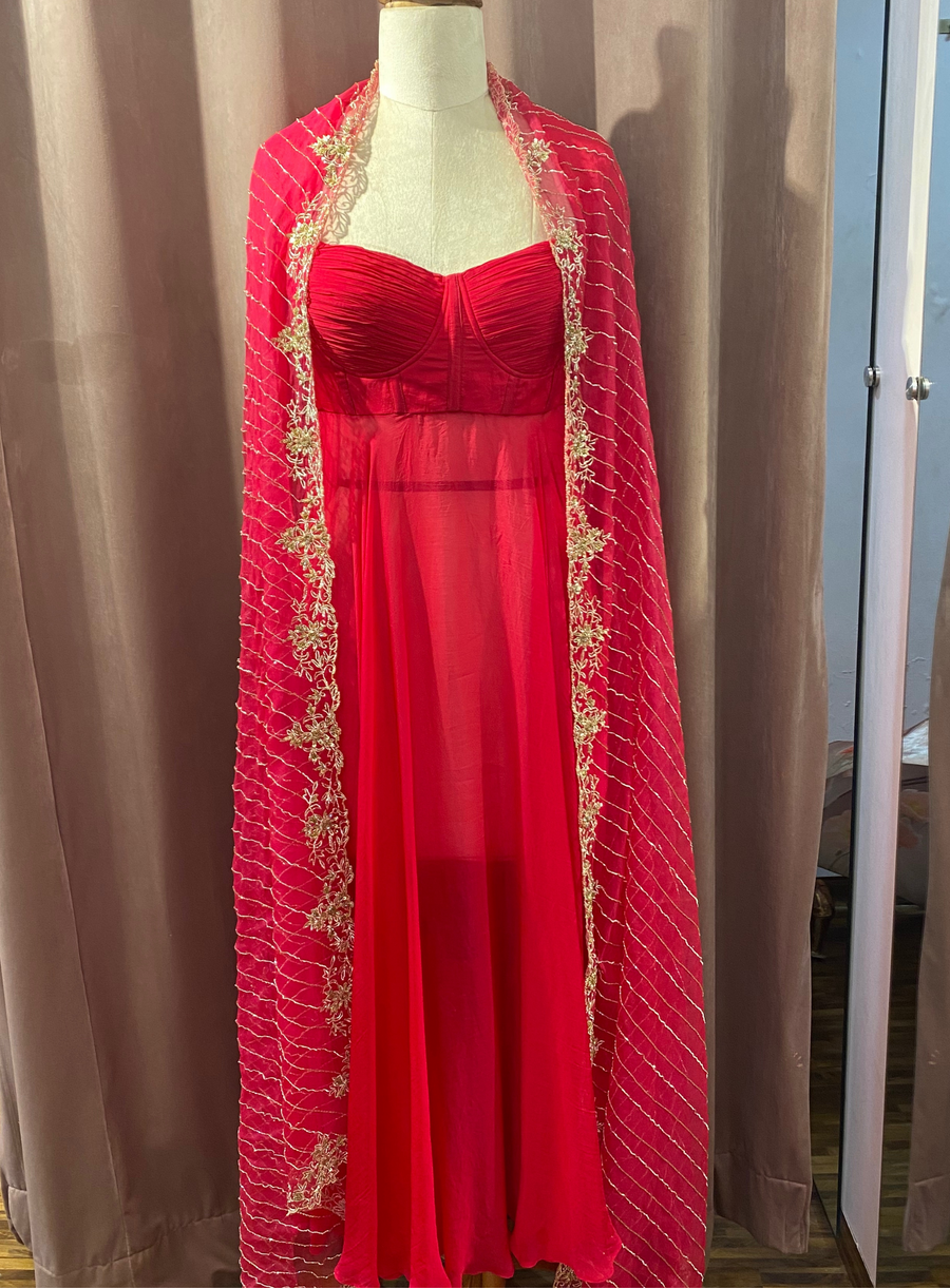 Hot pink Anarkali with zardozi-bordered striped dupatta, front view on a mannequin