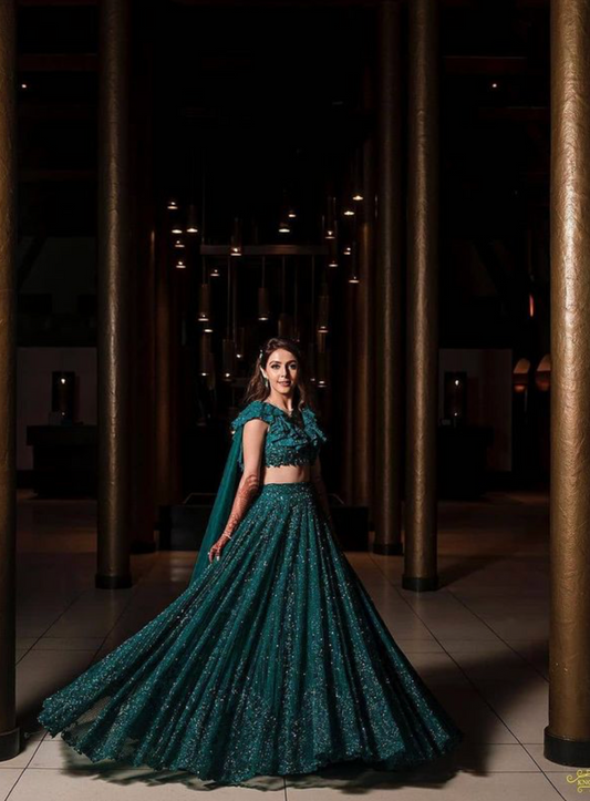 Meghna Sahijwani in our Teal Embellished Lehenga