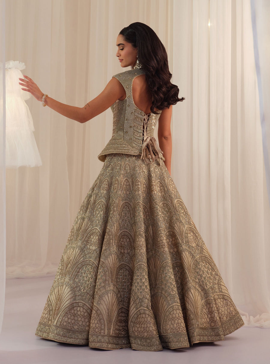 Back view of the ivory lace-up corset with fan-motif embroidered lehenga