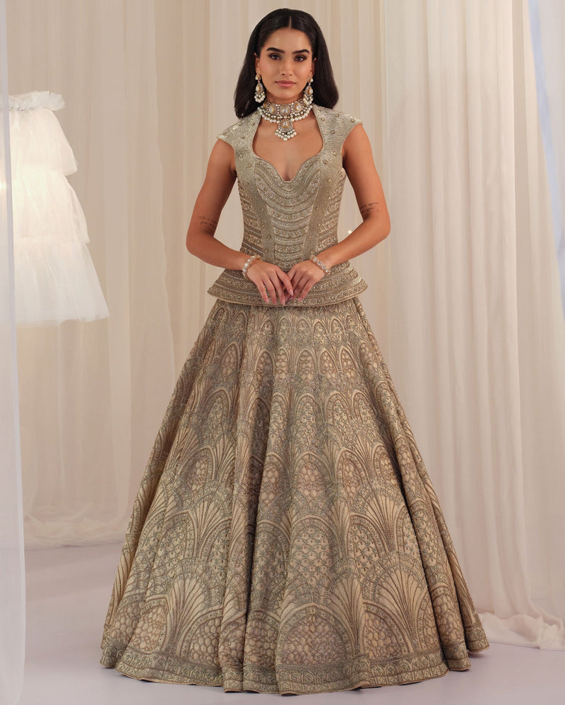 Ivory structured corset with raw silk lehenga and net dupatta, zardosi fan motifs