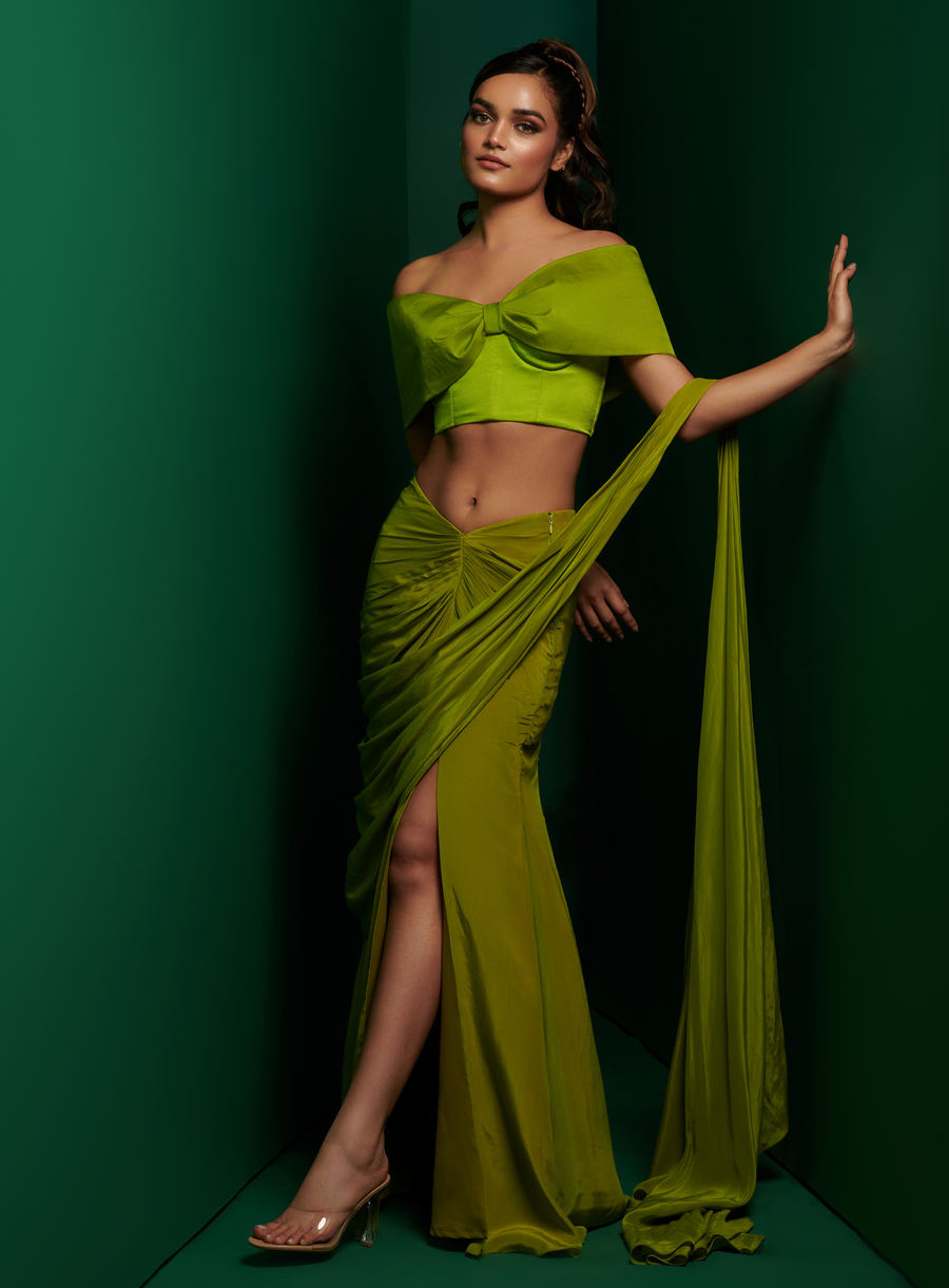 Lime green bow style blouse with slit skirt drape saree