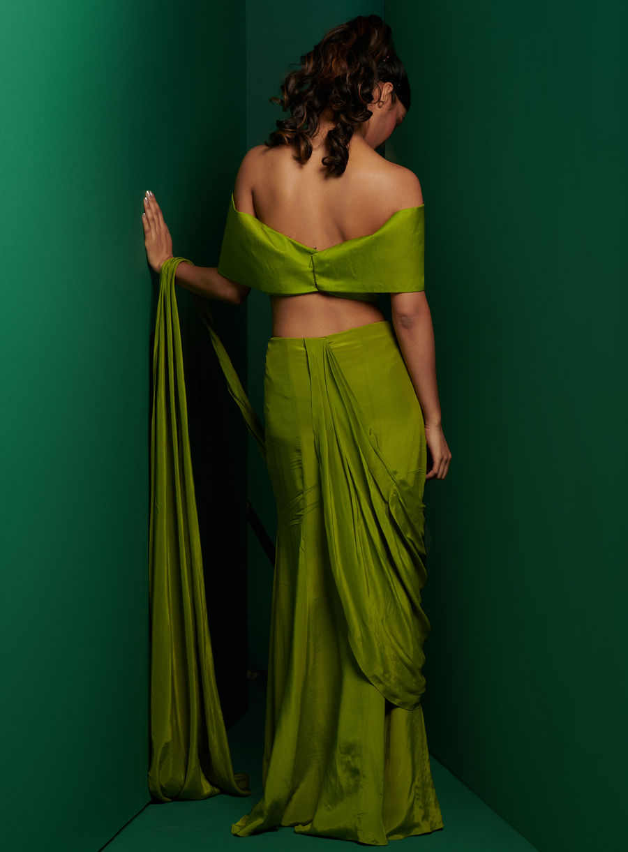 Back view of the lime green off-shoulder bow blouse with skirt drape saree