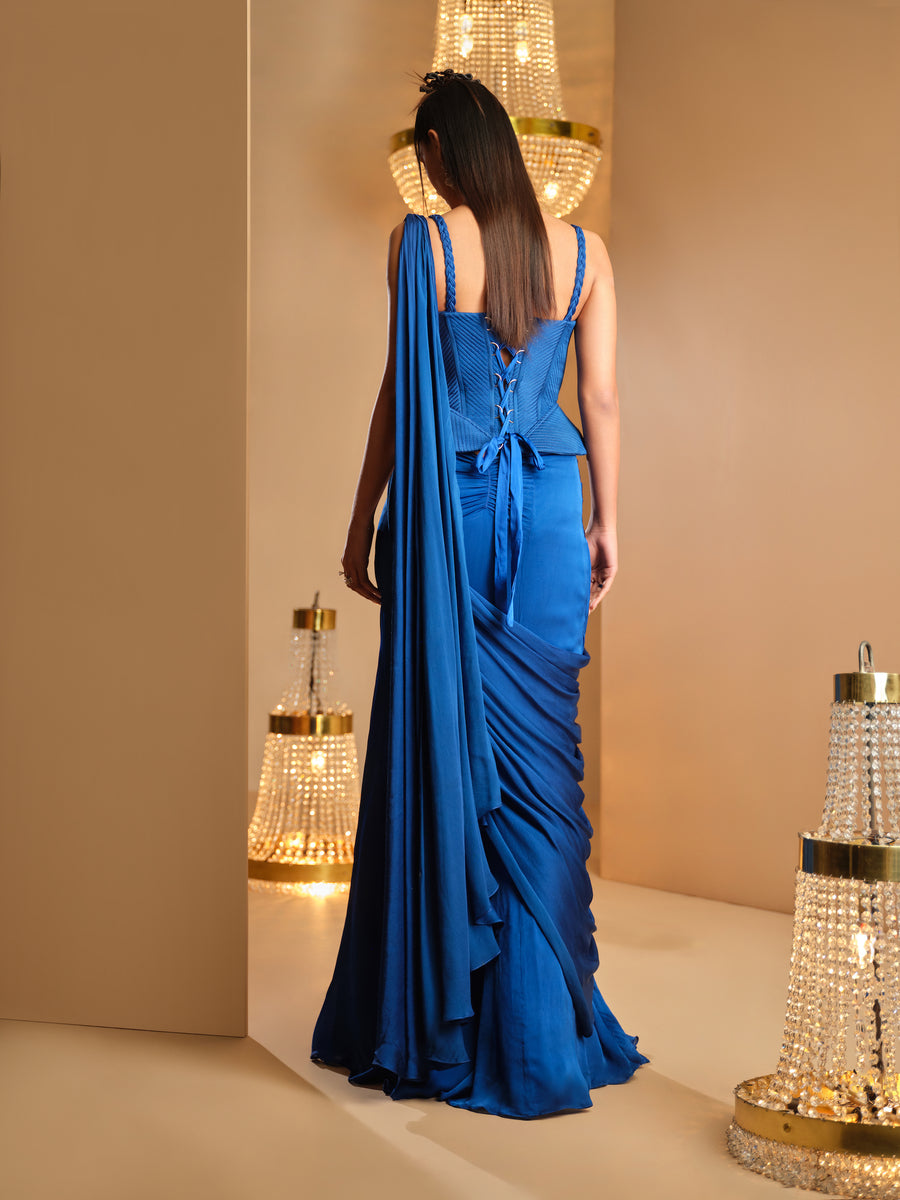 Back view of the blue lace-up quilted corset with drape saree