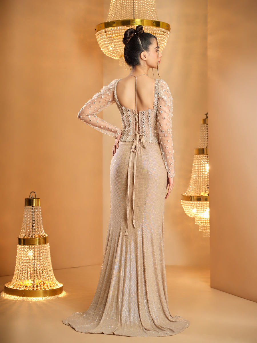Back view of the nude lace-up full sleeve corset with fitted draped skirt