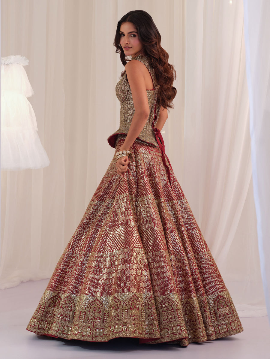 Side view of the peplum sculpt corset with maroon raw silk lehenga