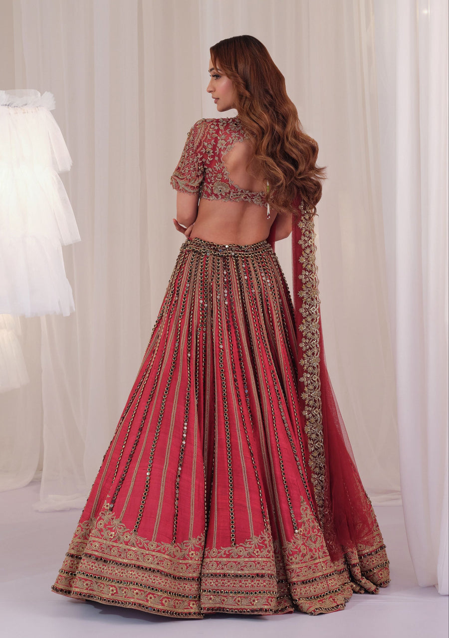 Back view of the maroon marodi lehenga with open-back blouse and net dupatta