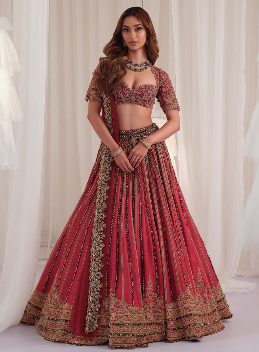 Maroon marodi raw silk lehenga with embroidered blouse and net dupatta