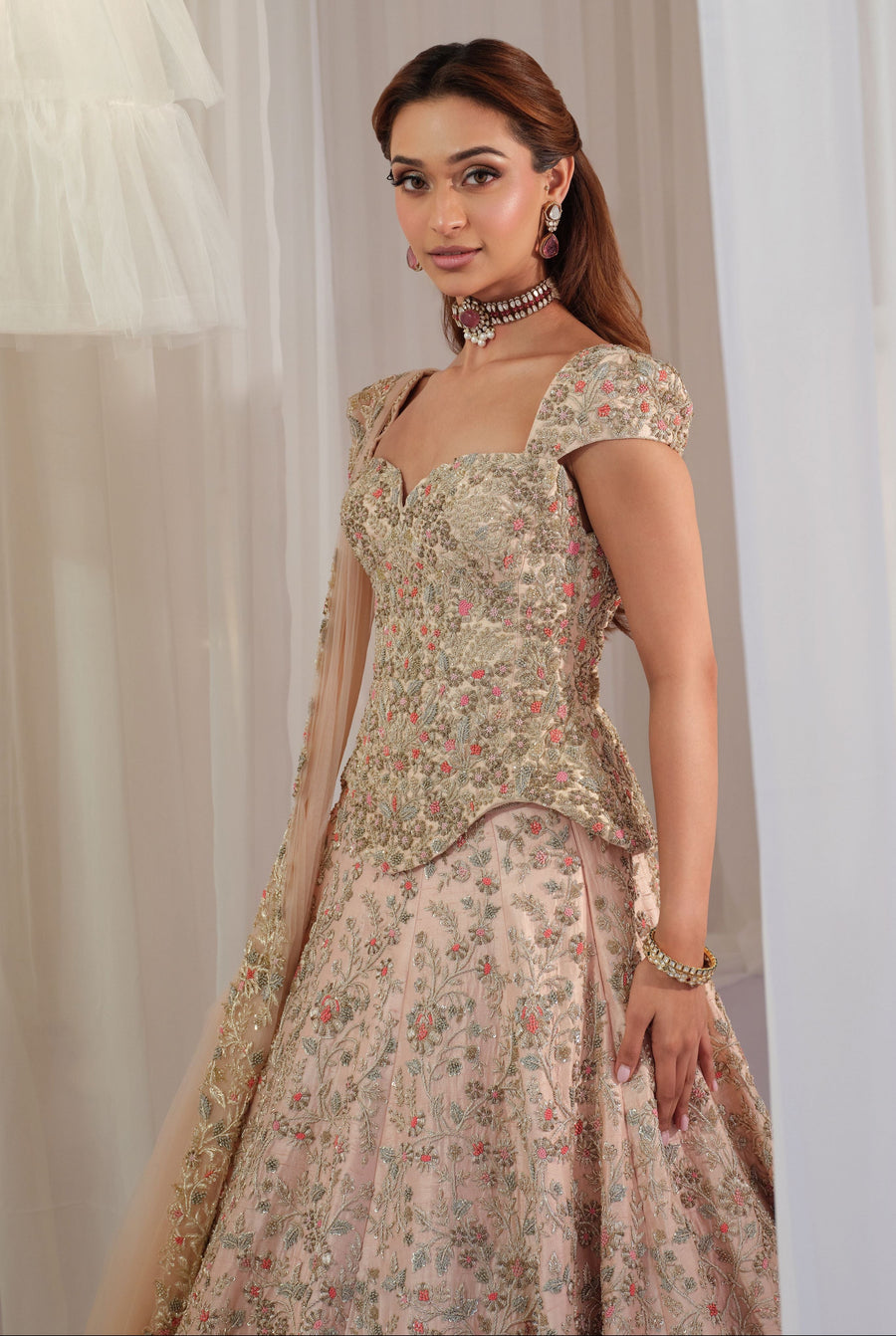 Close-up of the blush pink floral sweetheart corset with zardozi embroidery and dupatta
