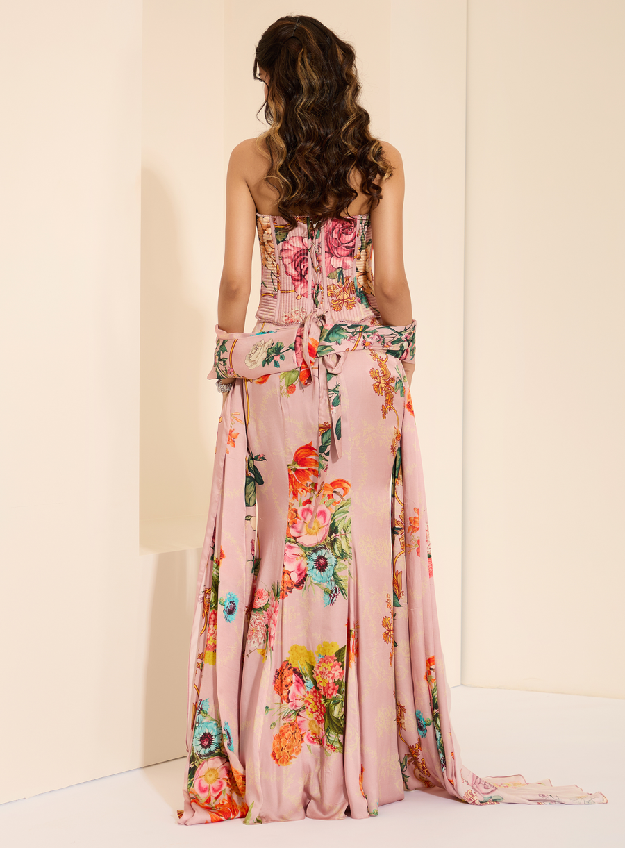 Back view of the pink floral-print lace-up corset with drape skirt and stole