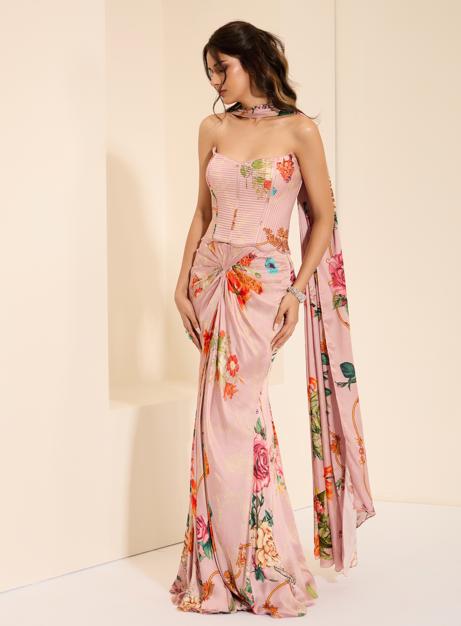 Full-length view of the pink floral-print strapless corset with knotted drape skirt and stole