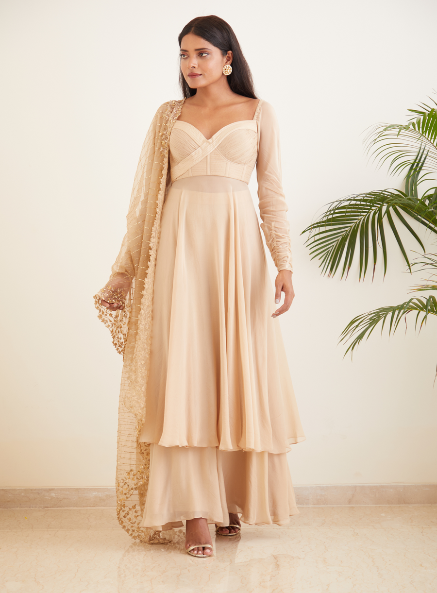 Full-length front view of the beige Anarkali with flared pants and dupatta