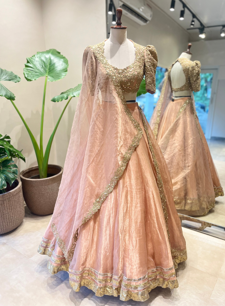 Peach lehenga set with intricate marodi embroidery