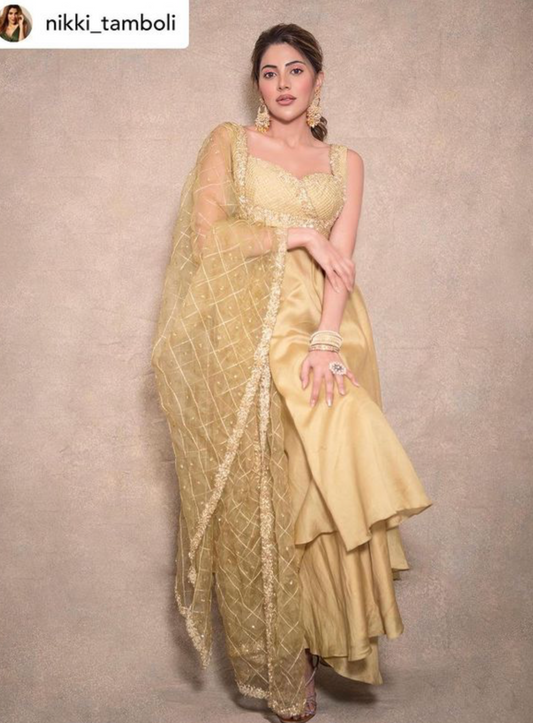 Nikki Tamboli in our Gold Anarkali