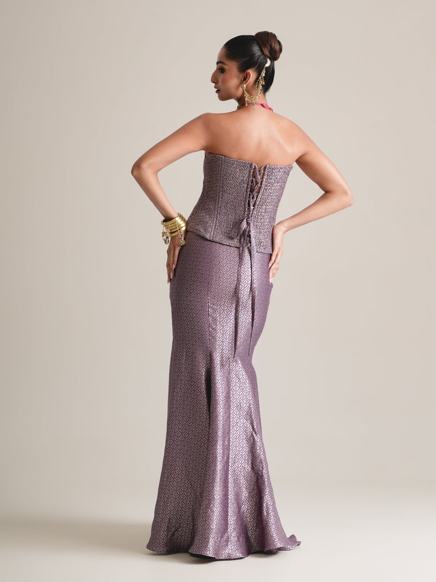 Back view of the lilac-grey corset with lace-up back and the fishcut skirt, full length