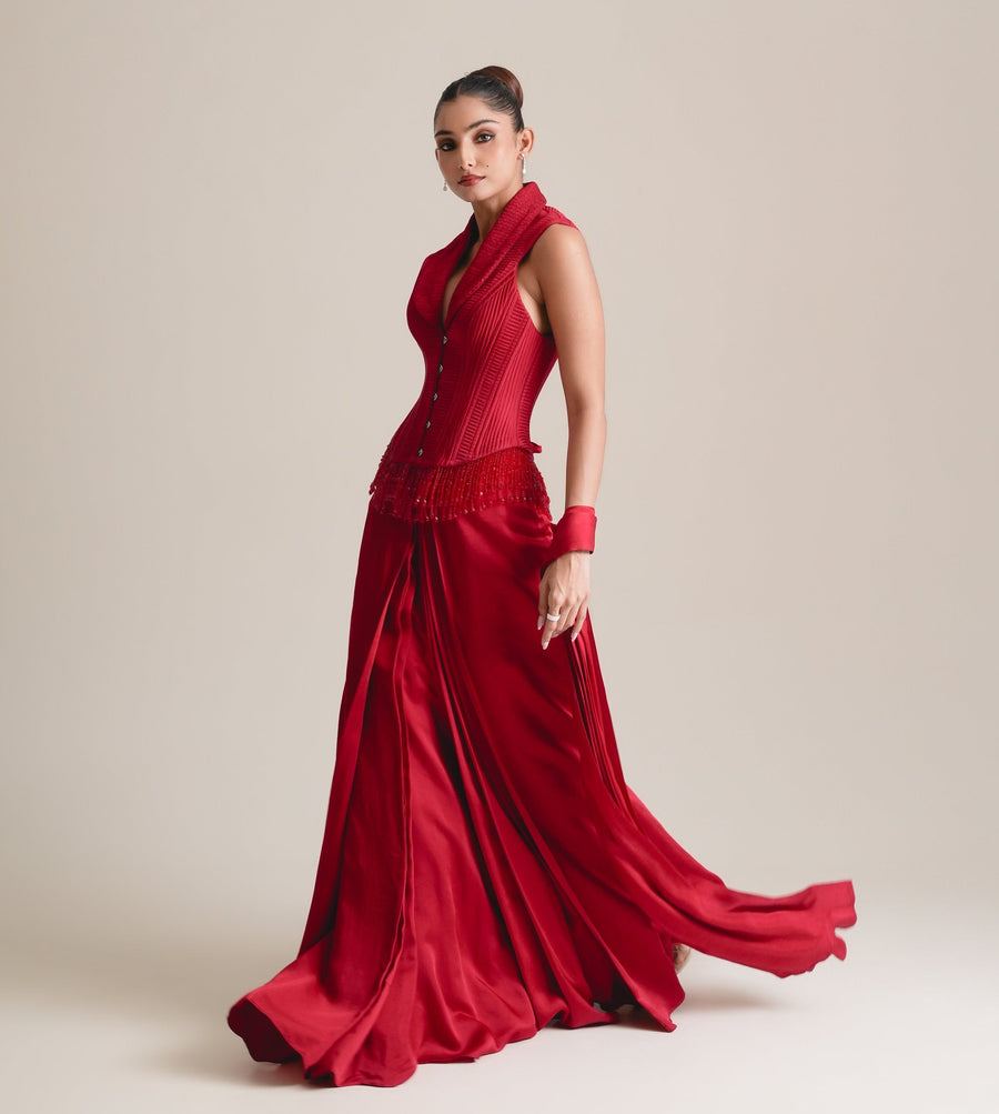 Red shawl-collar corset and flowing drape skirt, full-length view in movement