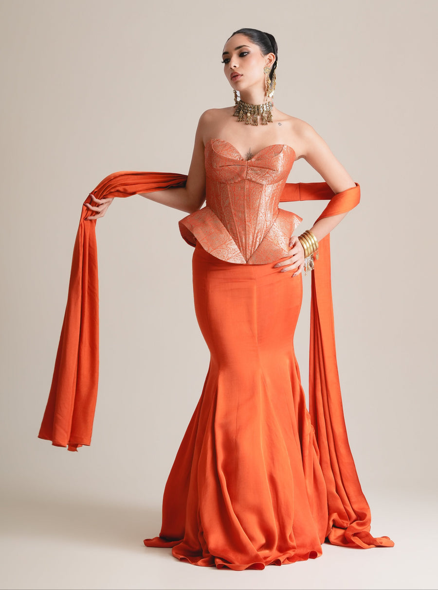 Copper-orange hand-woven Banarasi brocade corset with fishcut satin skirt and stole held out, full-length front view
