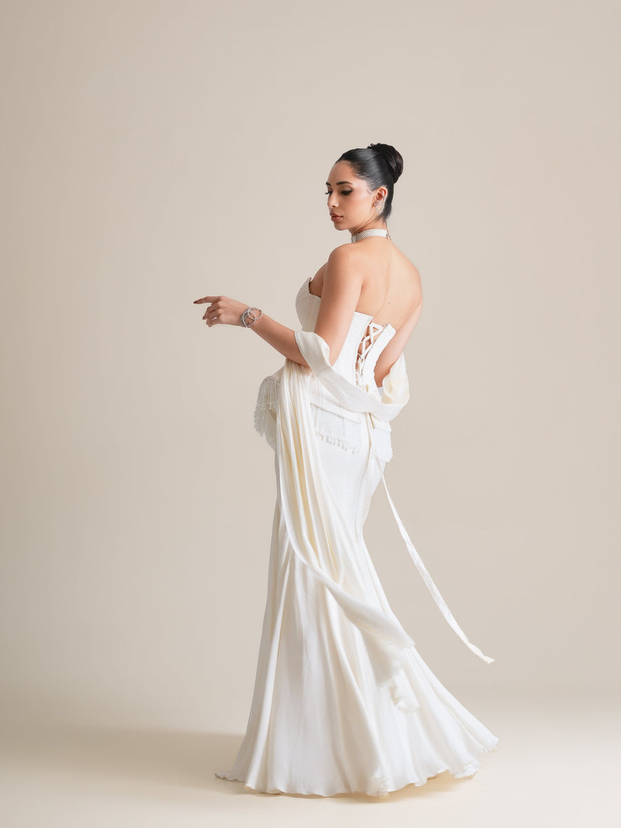 Ivory corset and drape skirt with the stole falling at the back, full-length turning view
