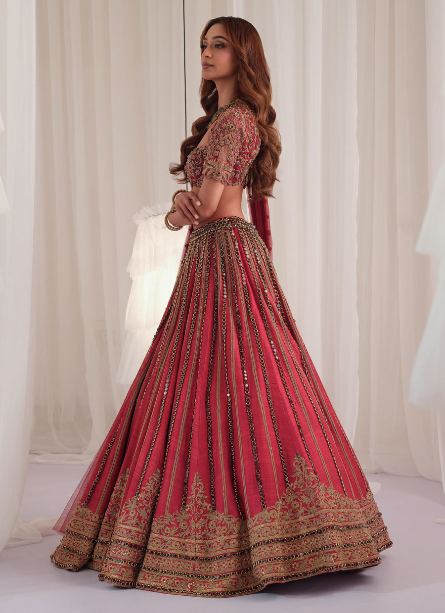 Side view of the maroon marodi raw silk lehenga with embroidered blouse